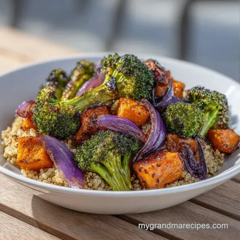 Vibrant roasted root vegetables arranged artistically over a base of fluffy quinoa with a drizzle of creamy sauce.
